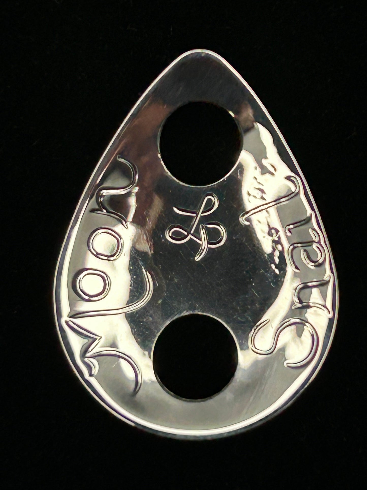 back of Moon Snail sterling silver hair jewellery designed and engraved by Laura Dutheil.