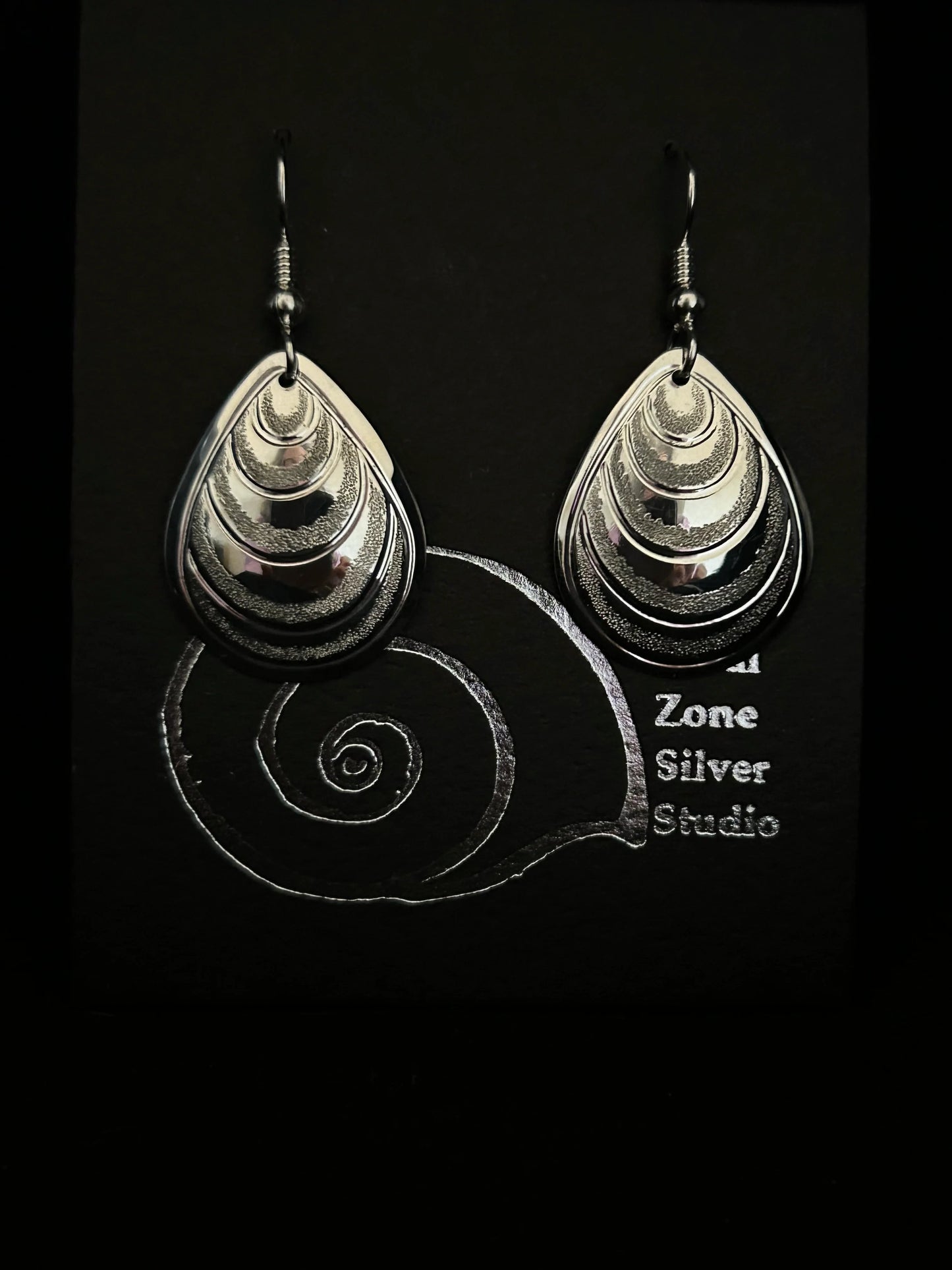 Butter Clams sterling silver large drops designed and engraved by Island artisan jeweller Laura Dutheil.