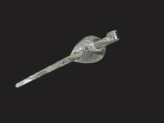 A lovely piece of sterling silver!  Hair jewellery designed and engraved by Laura Dutheil. The Butter Clam with sand dunes , inspired by nature on Haida Gwaii beaches.