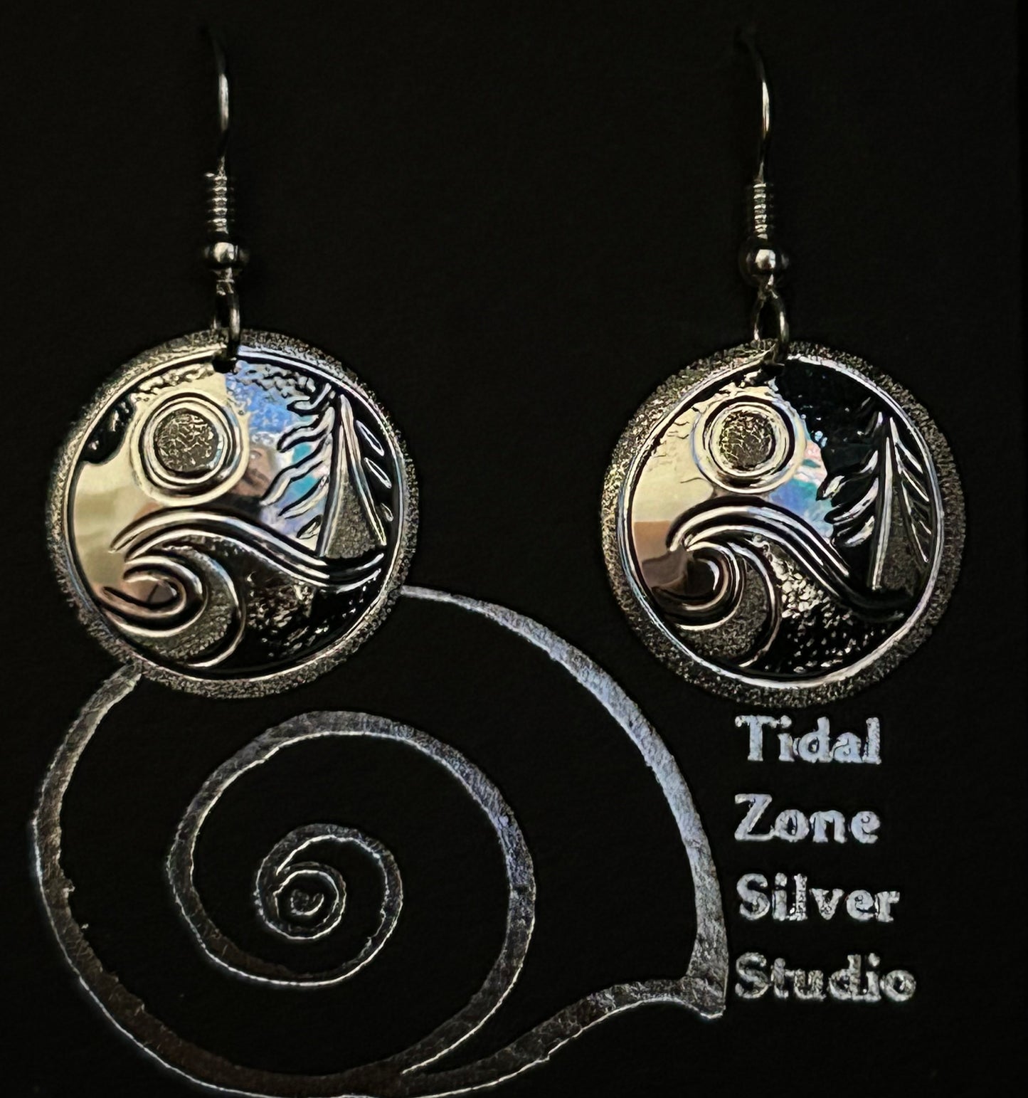 Full Moon with big wave and cedar tree designed and engraved by Island Artisan jeweller Laura Dutheil. Natural imagery inspired by nature of Haida Gwaii!