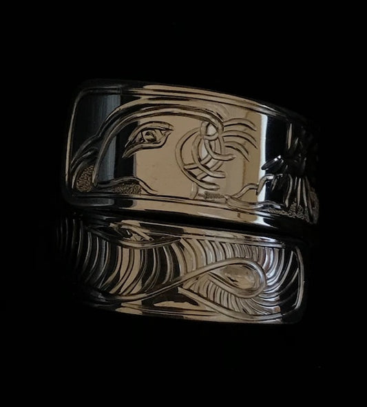 Sea Otter & Bull Kelp sterling silver wrap ring designed and engraved by island artisan jeweller Laura Dutheil
