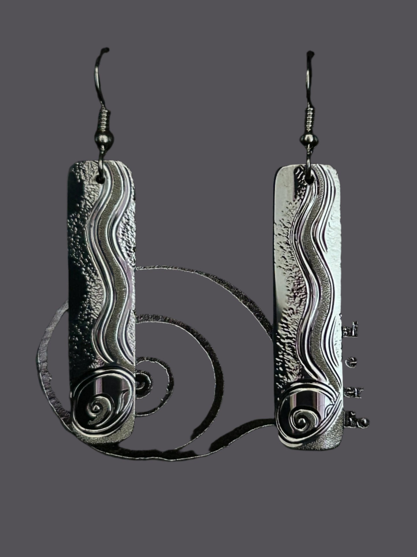 Moon Snails on the Beach sterling silver xlong dangles designed & engraved by Island artisan jeweller Laura Dutheil.
