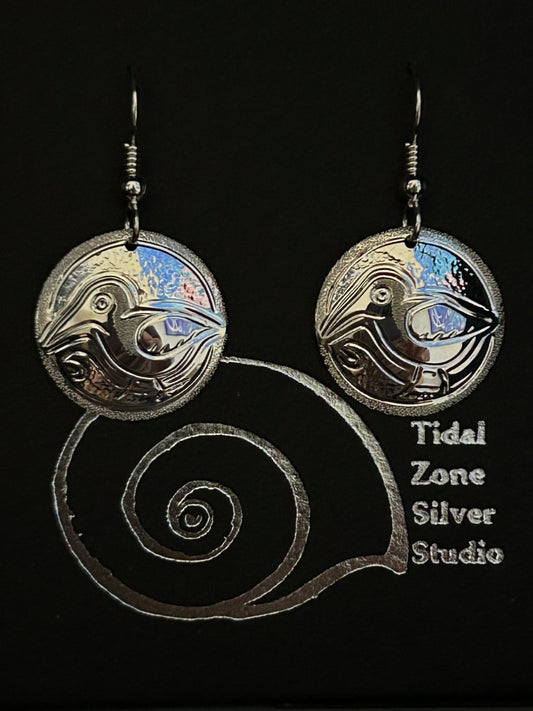 Sandpiper sterling silver earrings designed and engraved by island artisan jeweller Laura Dutheil.