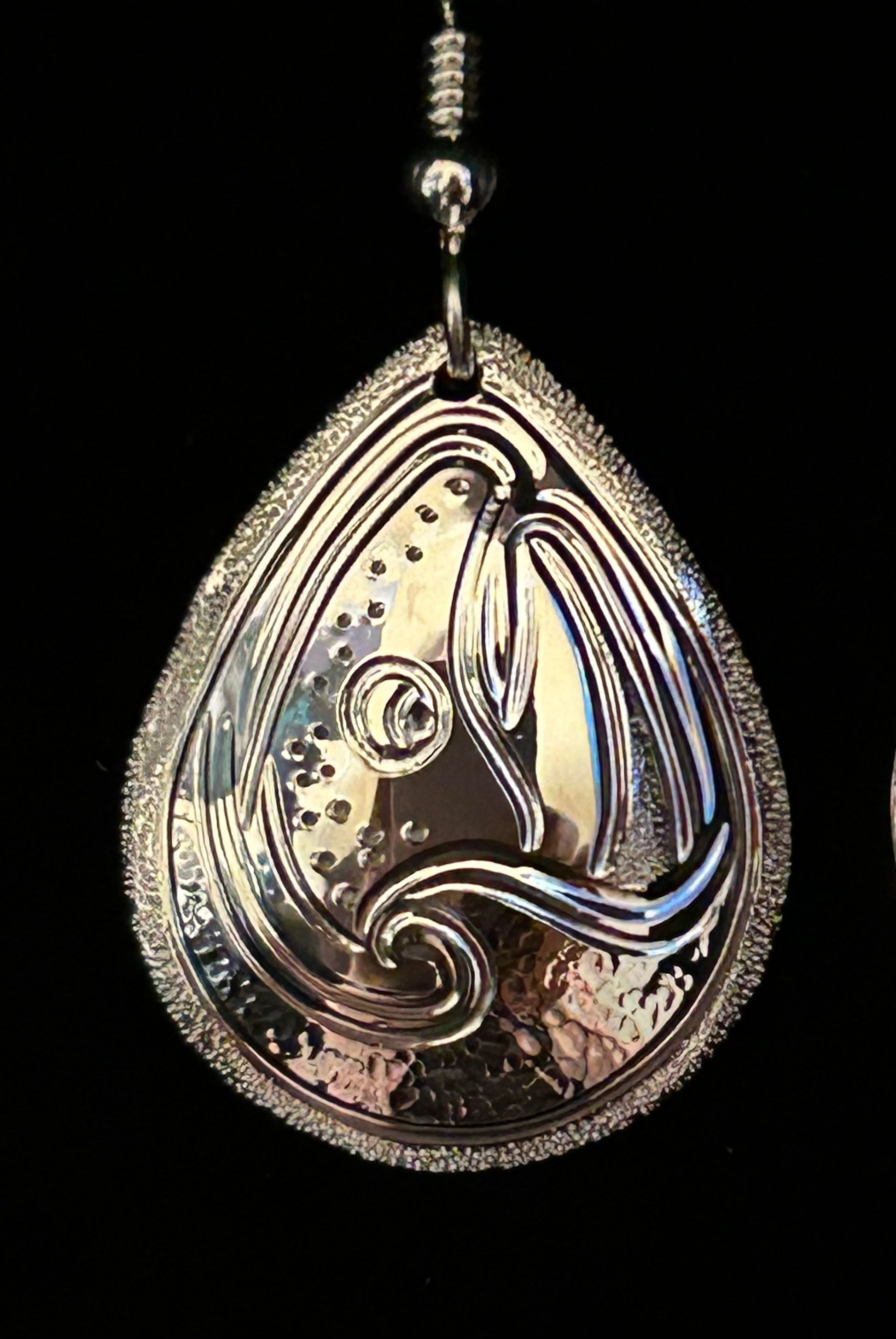 Salmon and wave sterling silver large drop designed and engraved by Island artisan jeweller Laura Dutheil.