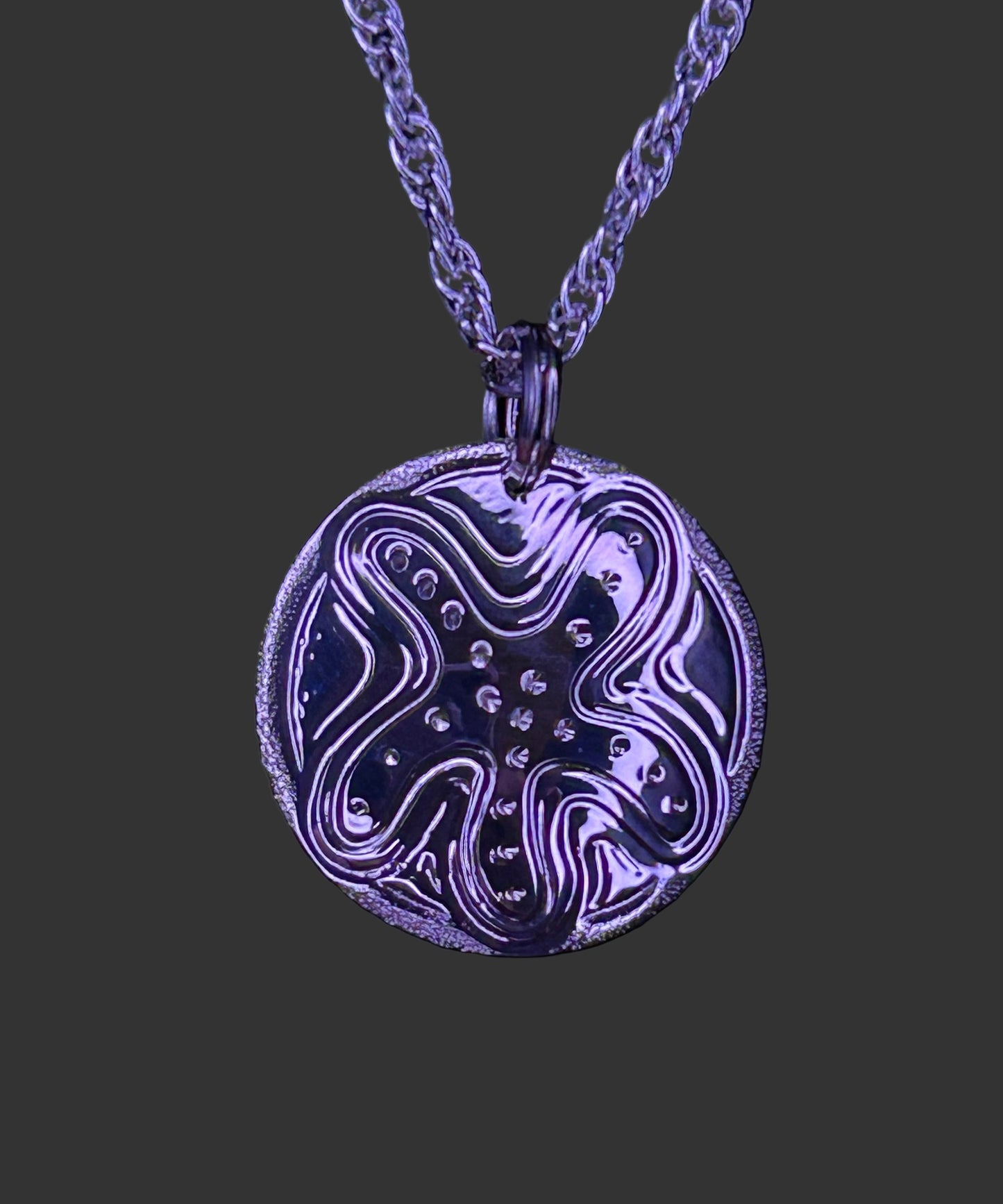 Starfish sterling silver 3/4 inch pendant by Laura Dutheil.