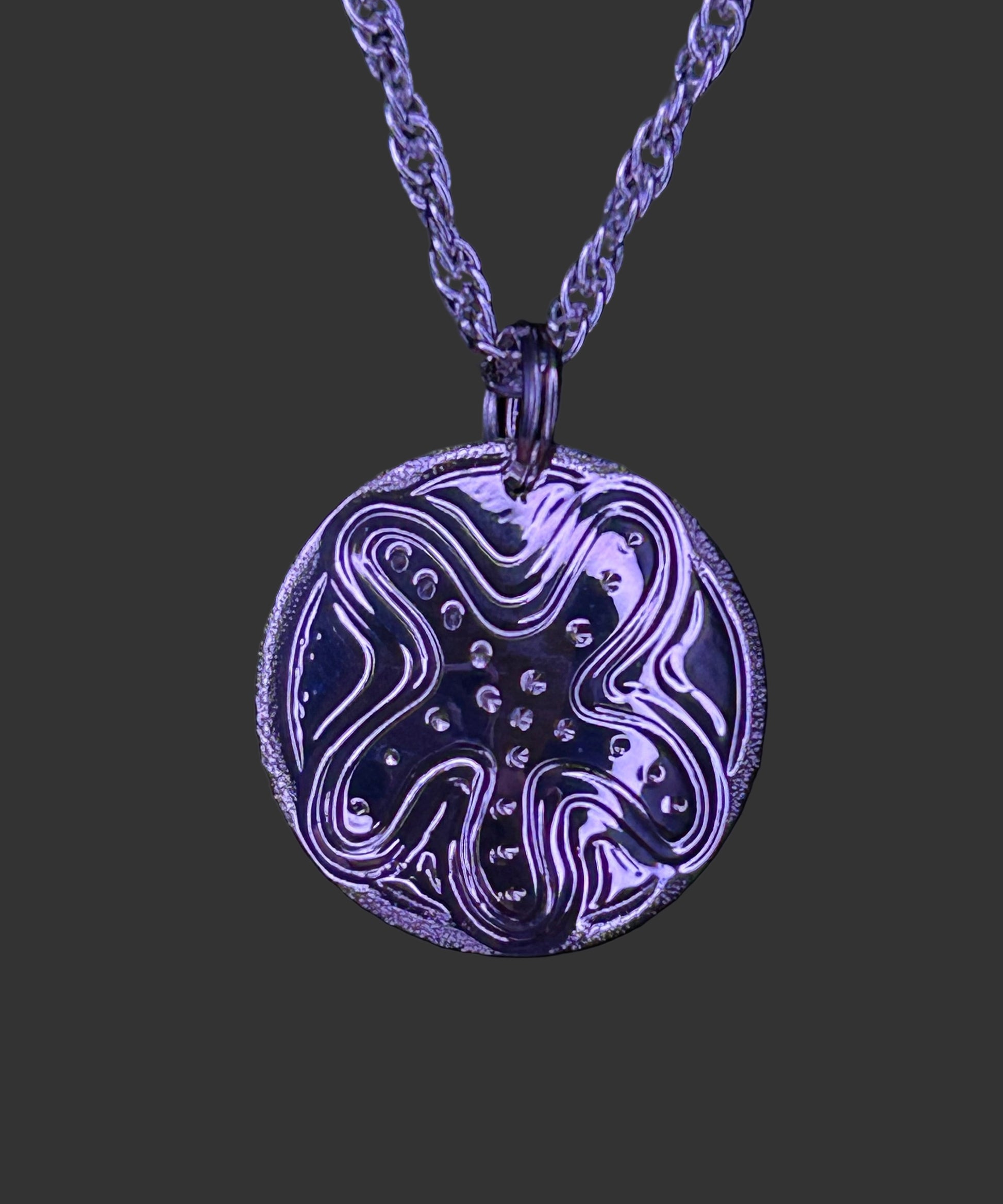 Starfish sterling silver 3/4 inch pendant by Laura Dutheil.