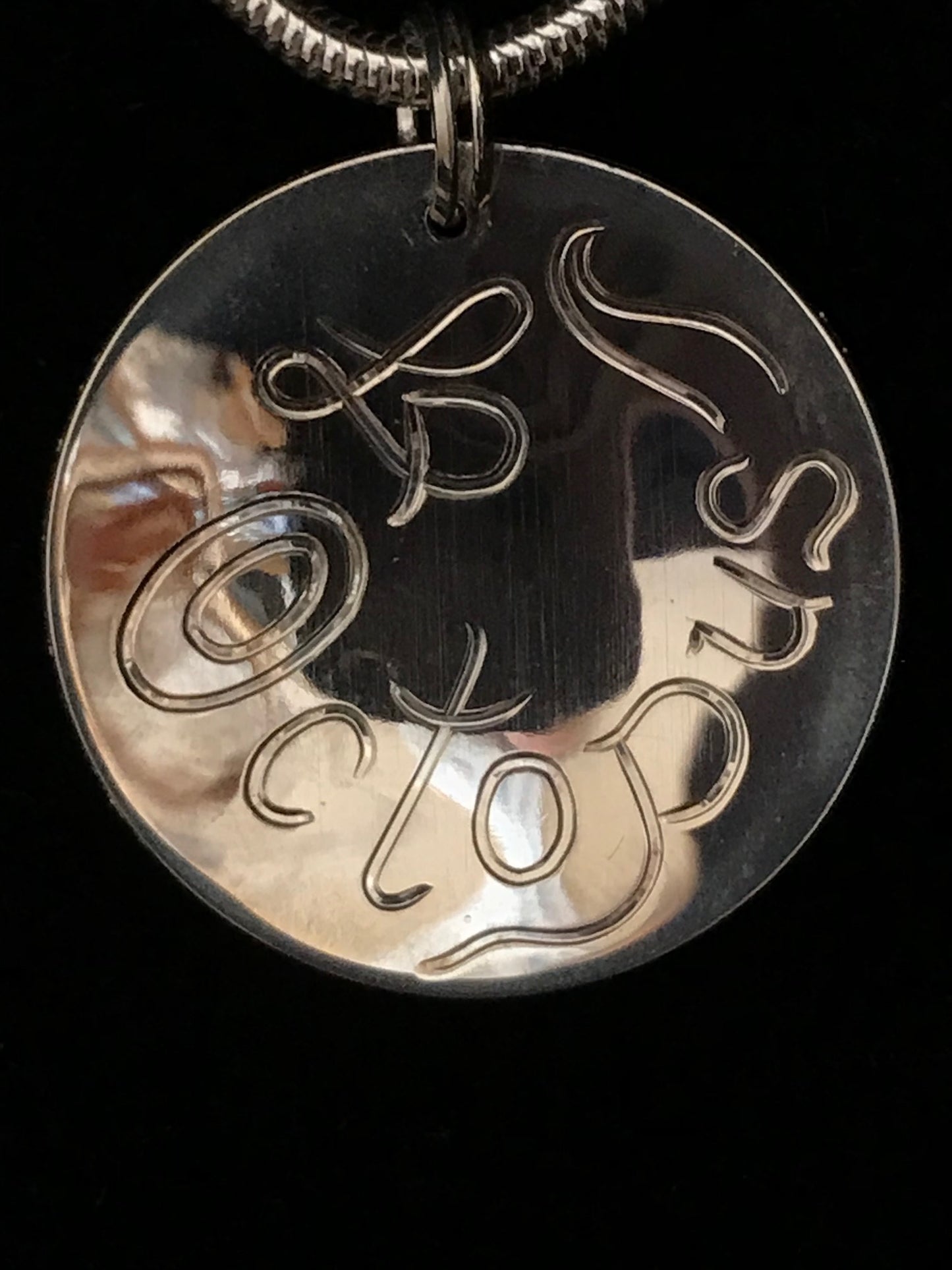 Back of Octopus sterling silver pendant by Laura Dutheil.
