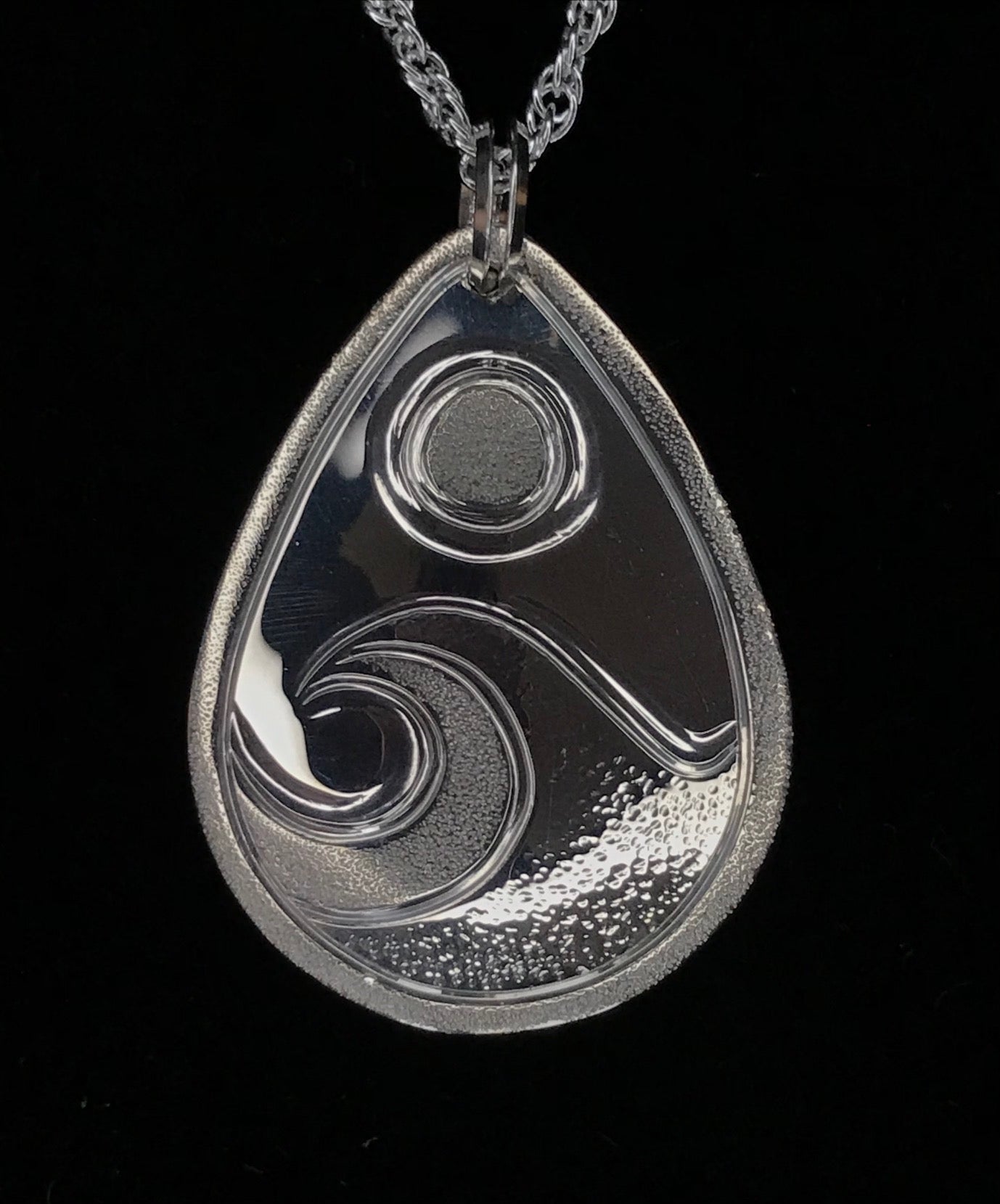 Follow The Tides sterling silver pendant by island artisan jeweller Laura Dutheil.