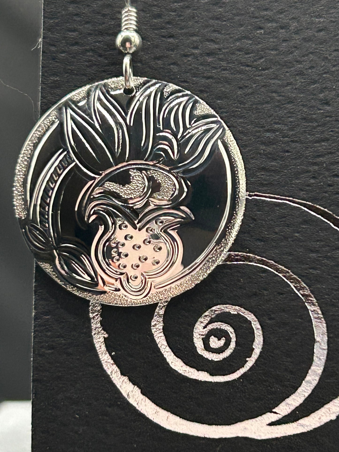 Lady Slipper sterling silver 1 inch round earring close up of pair.