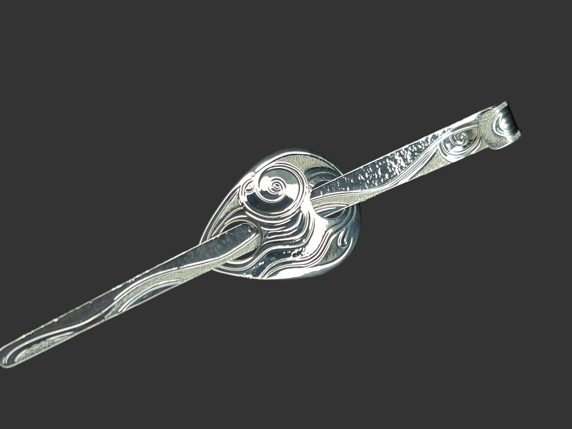 Moon Snail sterling silver hair jewellery designed and handcrafted by Island artisan jeweller Laura Dutheil.