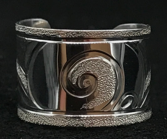 Moon snail sterling silver ear cuff designed & engraved by Laura Dutheil.