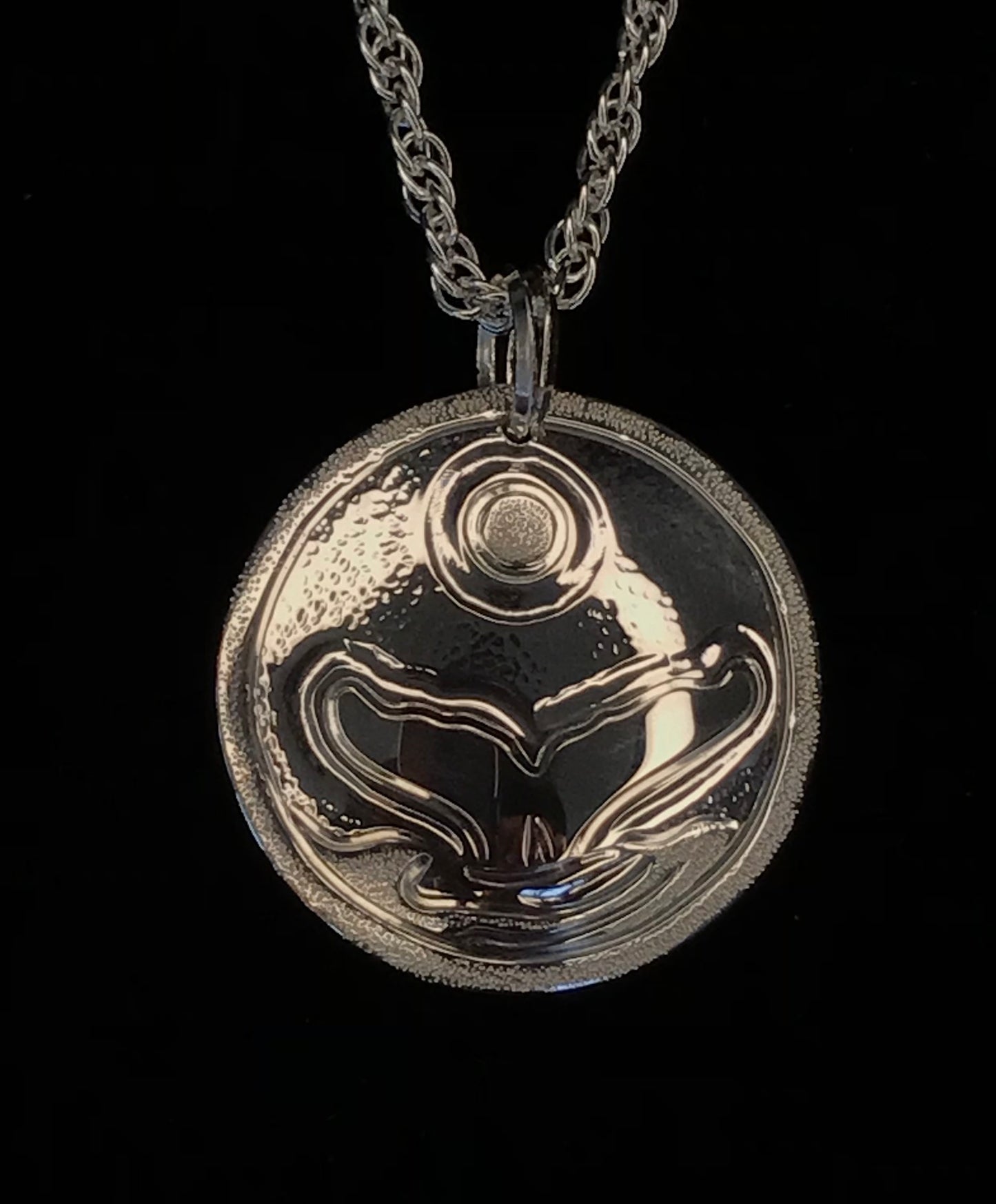 Whale Tail & Full Moon sterling silver pendant designed and engraved by Island artisan jeweller Laura Dutheil.
