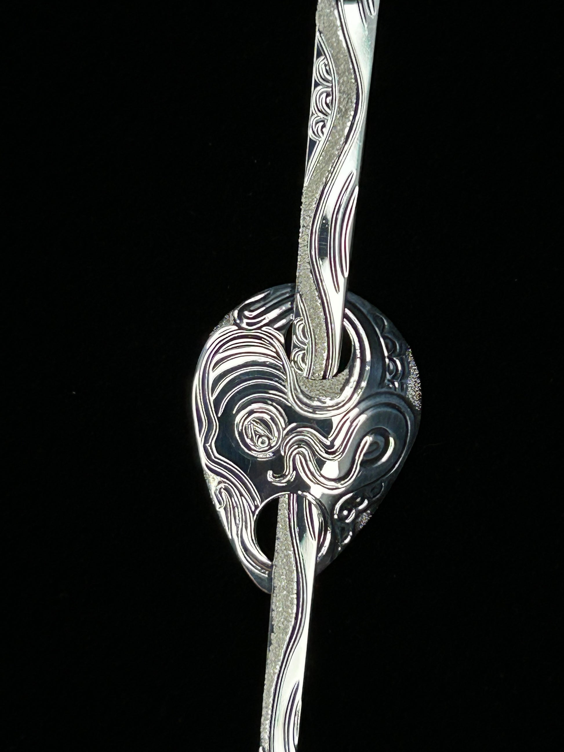 Close up of Octopus sterling silver hair jewellery by Laura Dutheil.