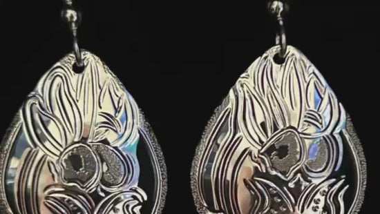 Lady Slippers sterling silver large drops designed and engraved by island artisan jeweller Laura Dutheil.