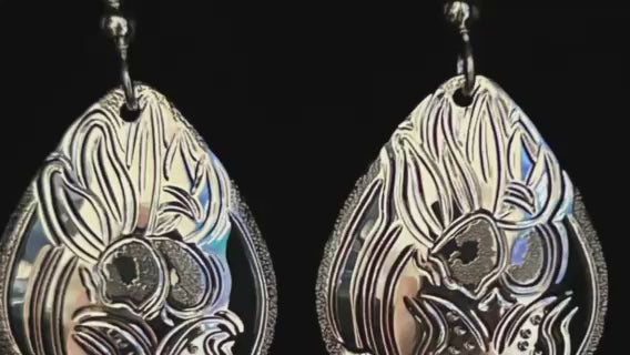 Lady Slippers sterling silver large drops designed and engraved by island artisan jeweller Laura Dutheil.