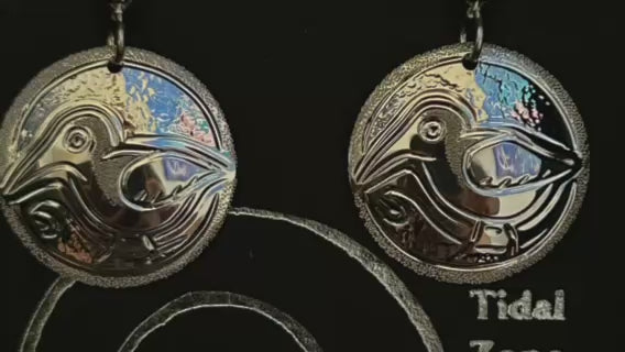Sandpipers on the beach is a little video of the sterling silver sandpiper round earrings designed and engraved by island artisan jeweller Laura Dutheil.