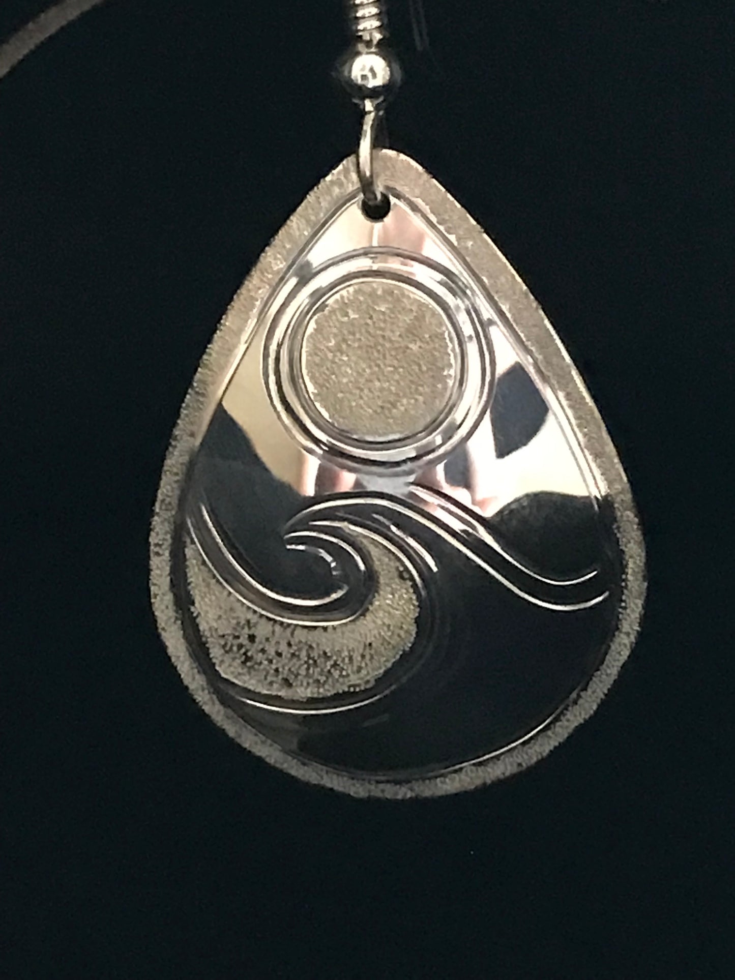 Close up of Full Moon & Wave sterling silver xlarge drop by Laura Dutheil.
